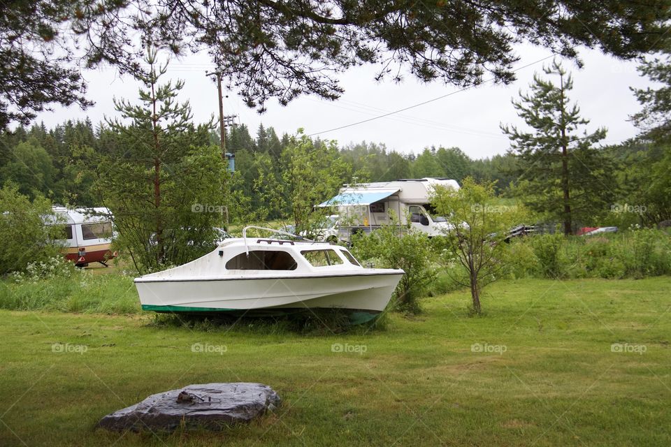 broken boat on the farm