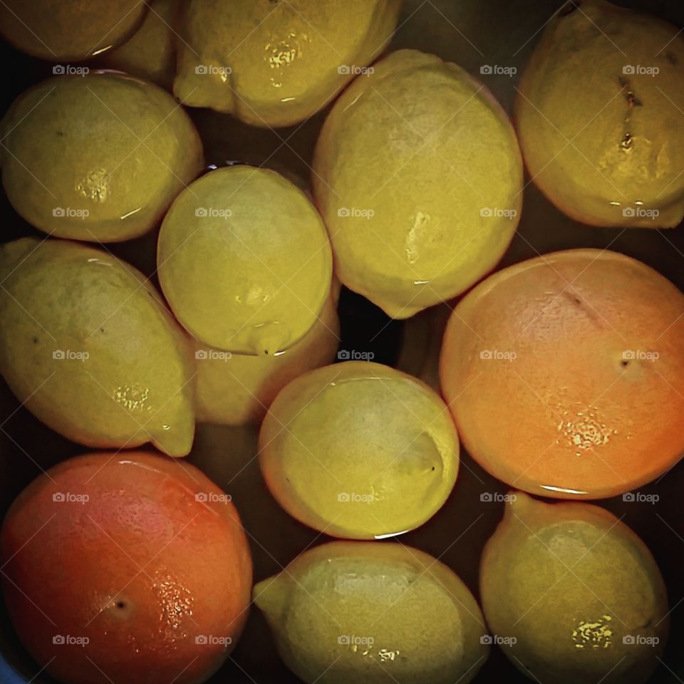 citrus bath. a friend gave me a large amount of lemons and some grapefruit.  here they are soaking in a sink full of water