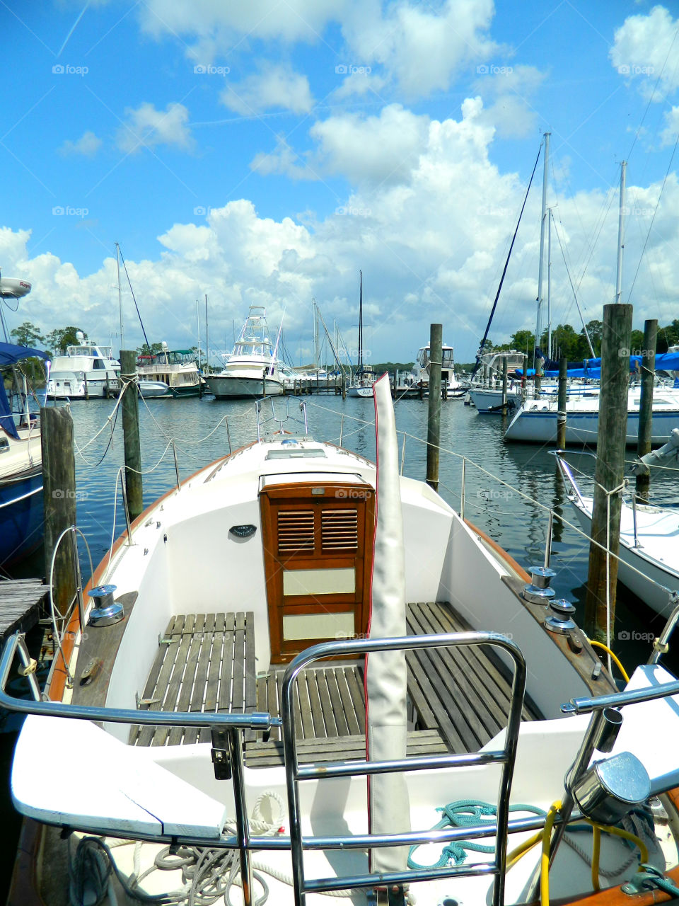 Boats moored at harbor