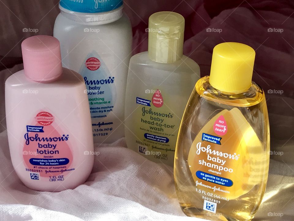 Johnson and Johnson baby products with a soft pink background