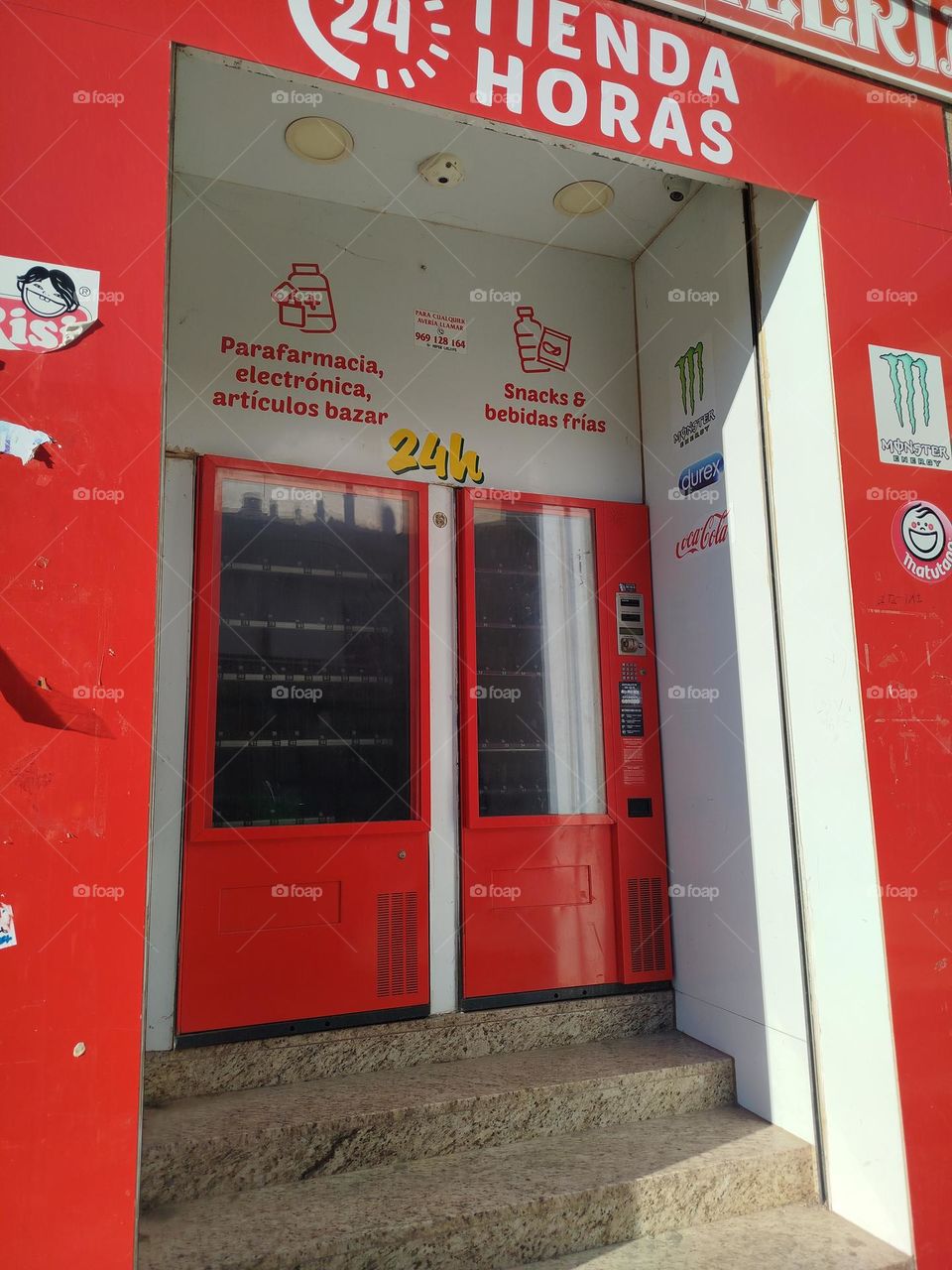 old pharmacy machine now discontinued, striking red color a memory in time