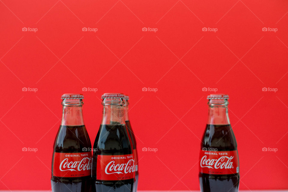 Coke on red background 