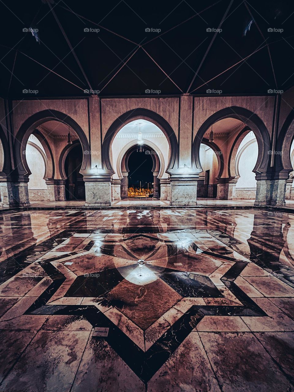 A mosque just before the start of late night Tahajjud Ramadan prayers on a rainy night 