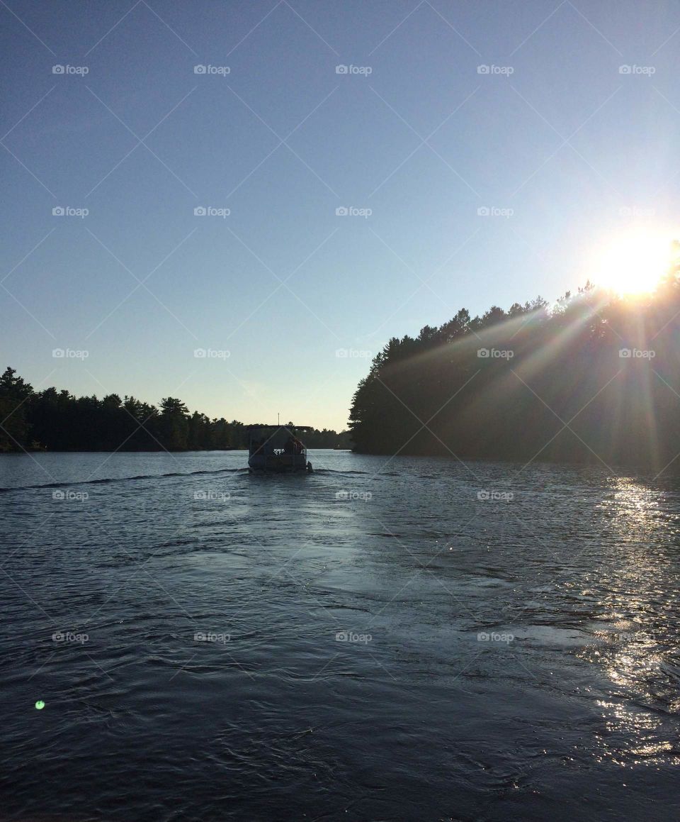 This moment was captured after lifelong friends gathered to spread the ashes of a beloved friend at his favourite fishing spot on Trout Lake. 