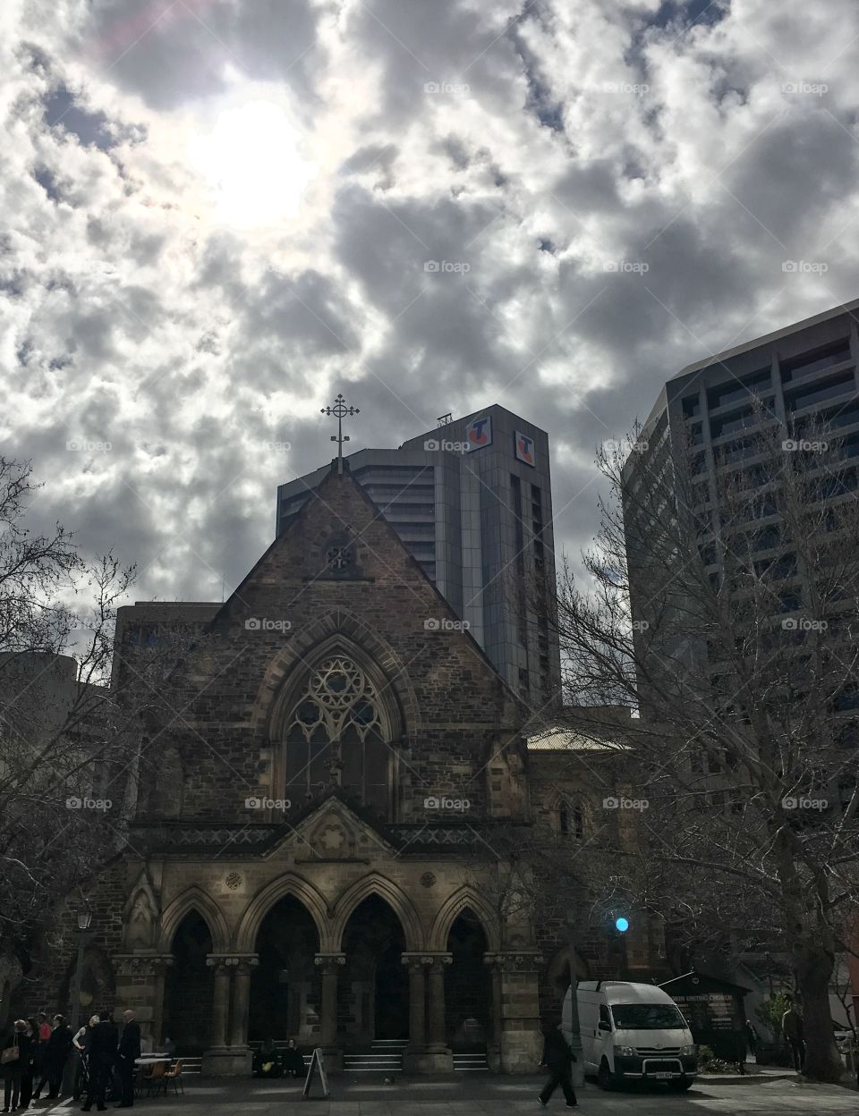 Old historic church against a dark cloudy sky gothic appeal