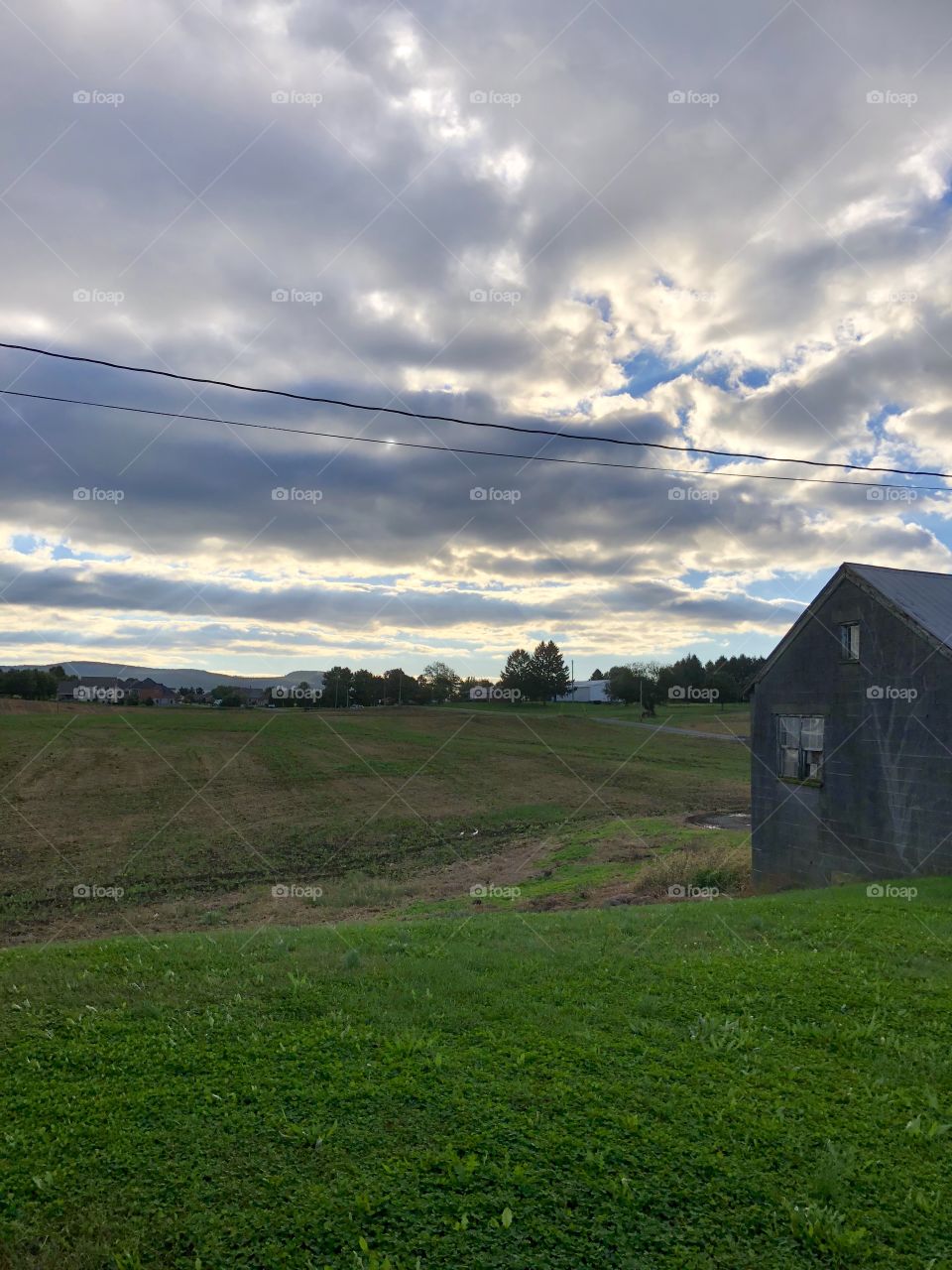 Sunrise on the farm cloudy fall day 