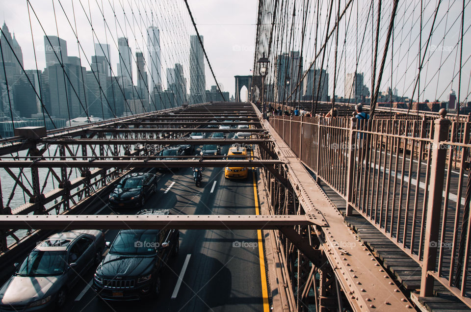 The iconic Brooklyn Bridge with NYC skyline in the background