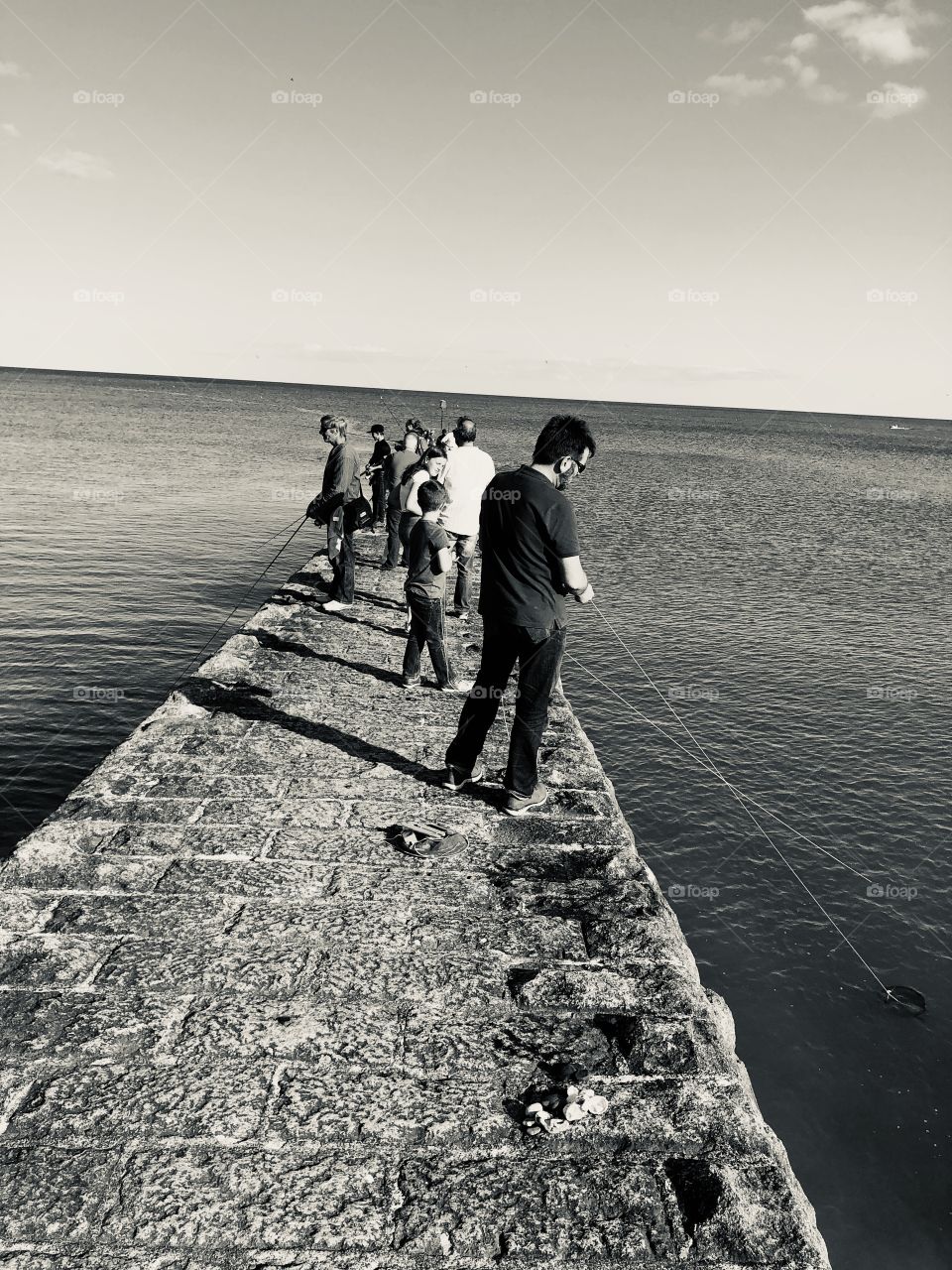 I love this photo also as there are so many fishermen in such a small space in Devon, UK