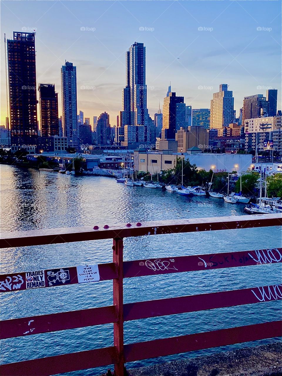 This is the gorgeous view of LIC, Queens as well as “Manhattan” from the “Pulaski Bridge” at “Newtown Creek” about halfway across the bridge on a warm sunny Indian summer evening in early October 2023. Hypnotic Productions