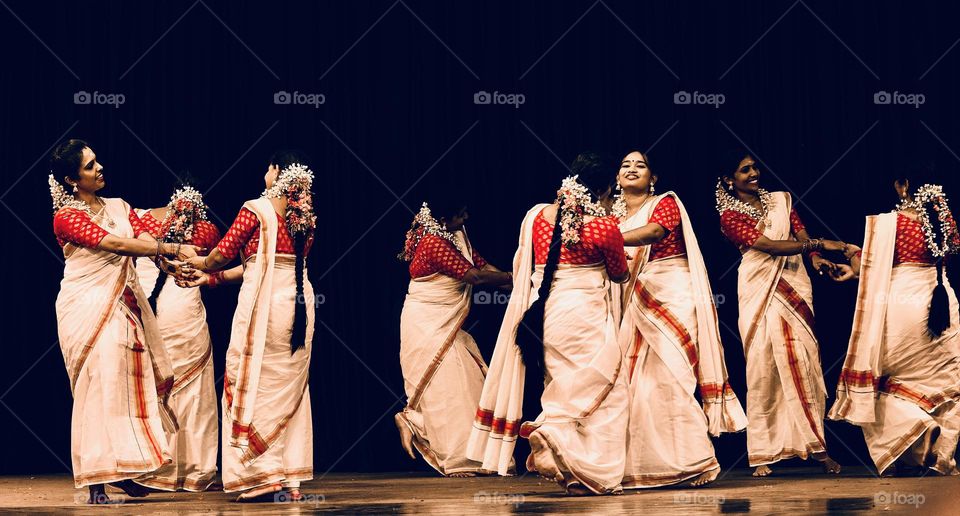 A public performance of classical folklore  dance - group of female 