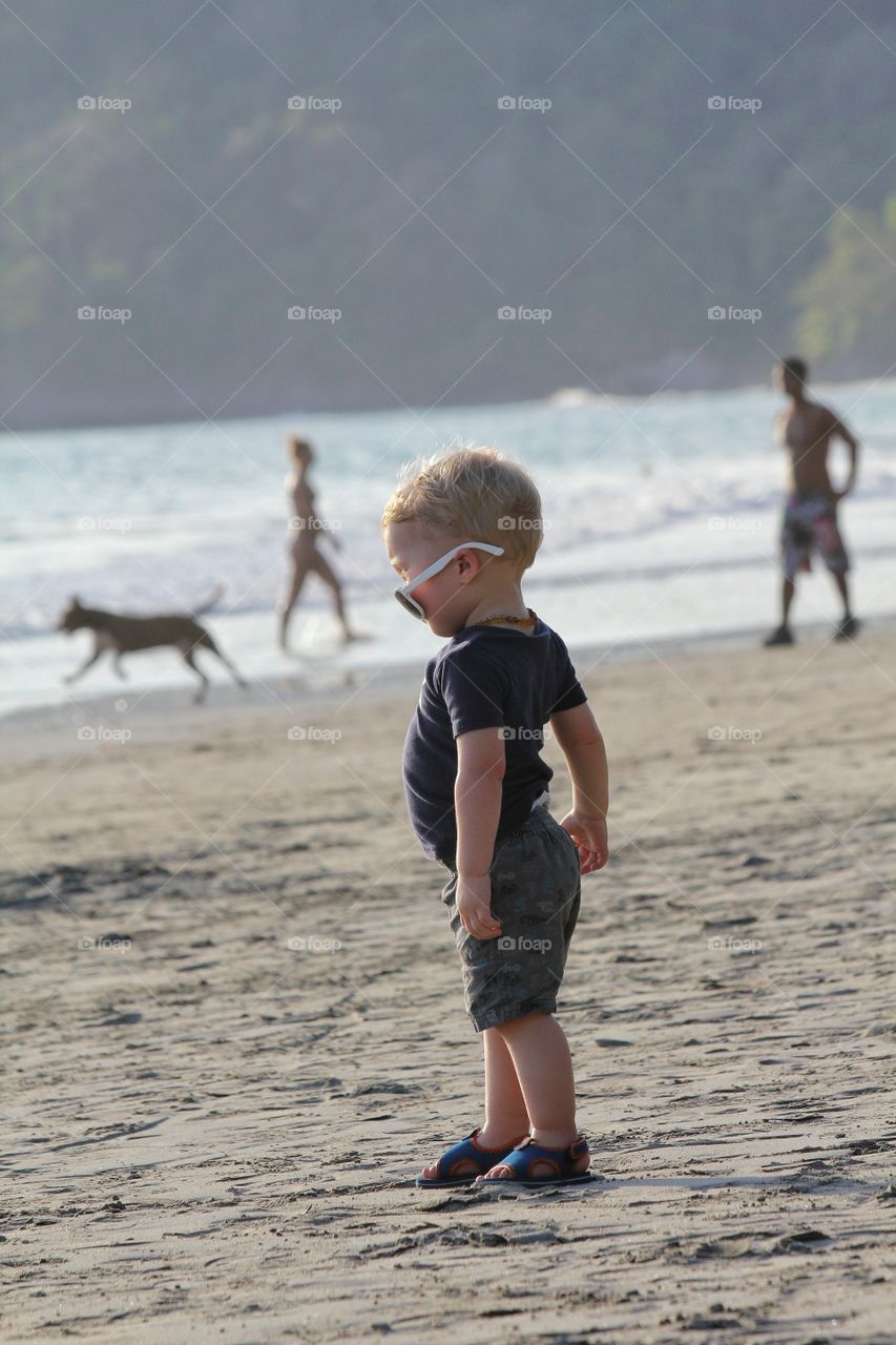 Little boy with his shades on 