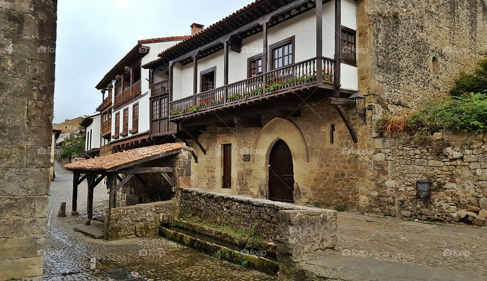 Santillana del Mar. Washing place and typical houses.