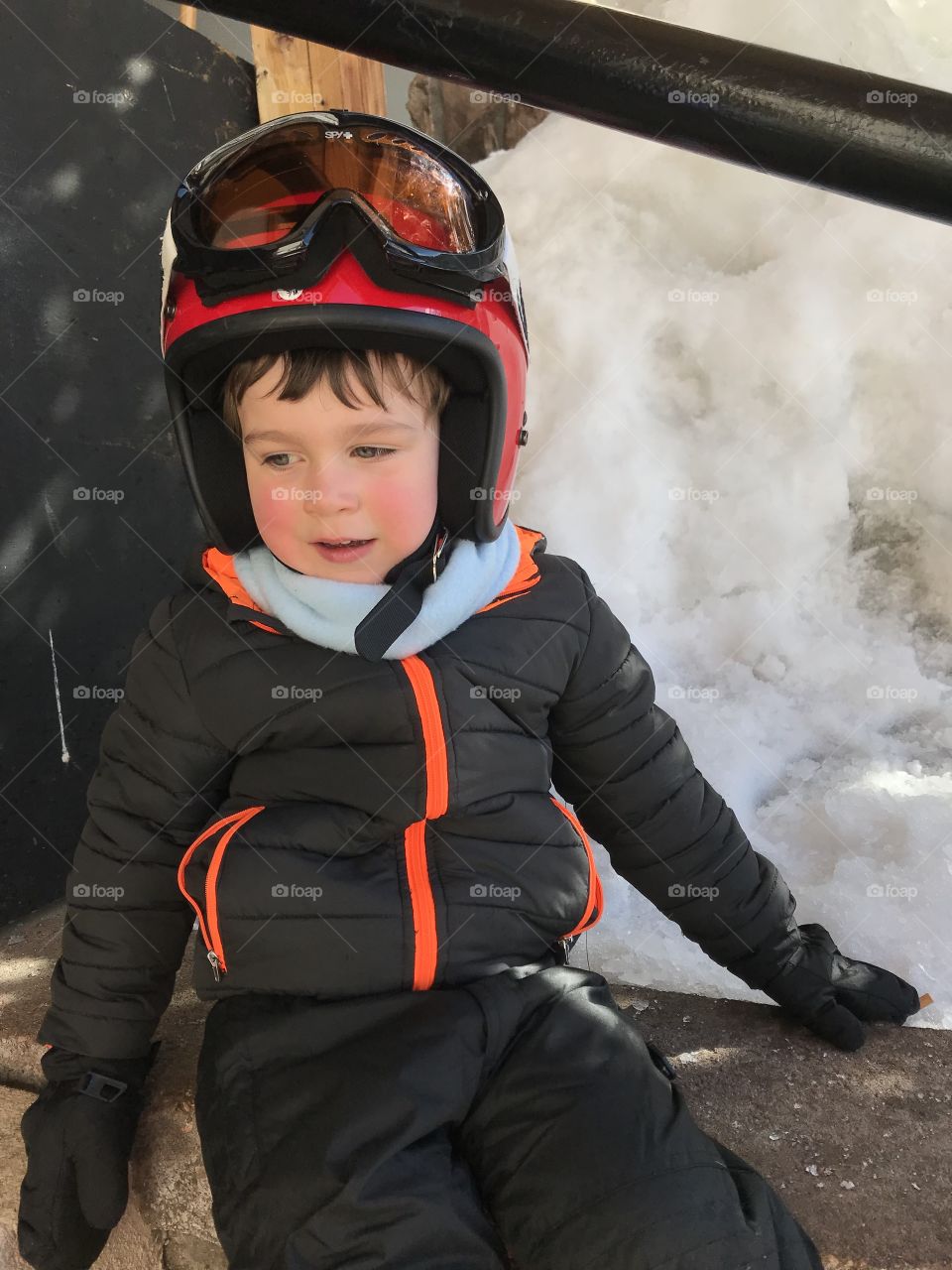 Boy with ski goggles and helmet