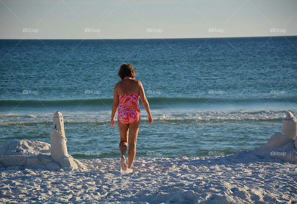 Building sandcastles and going for a dip 