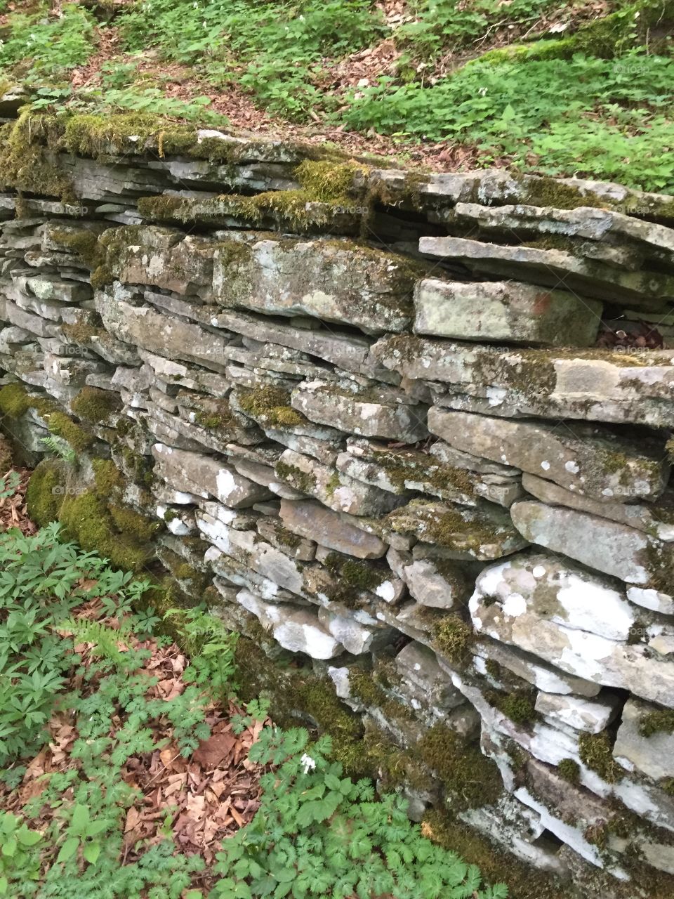 Stacked stone wall