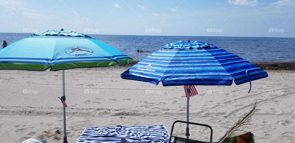 two umbrellas under the sun