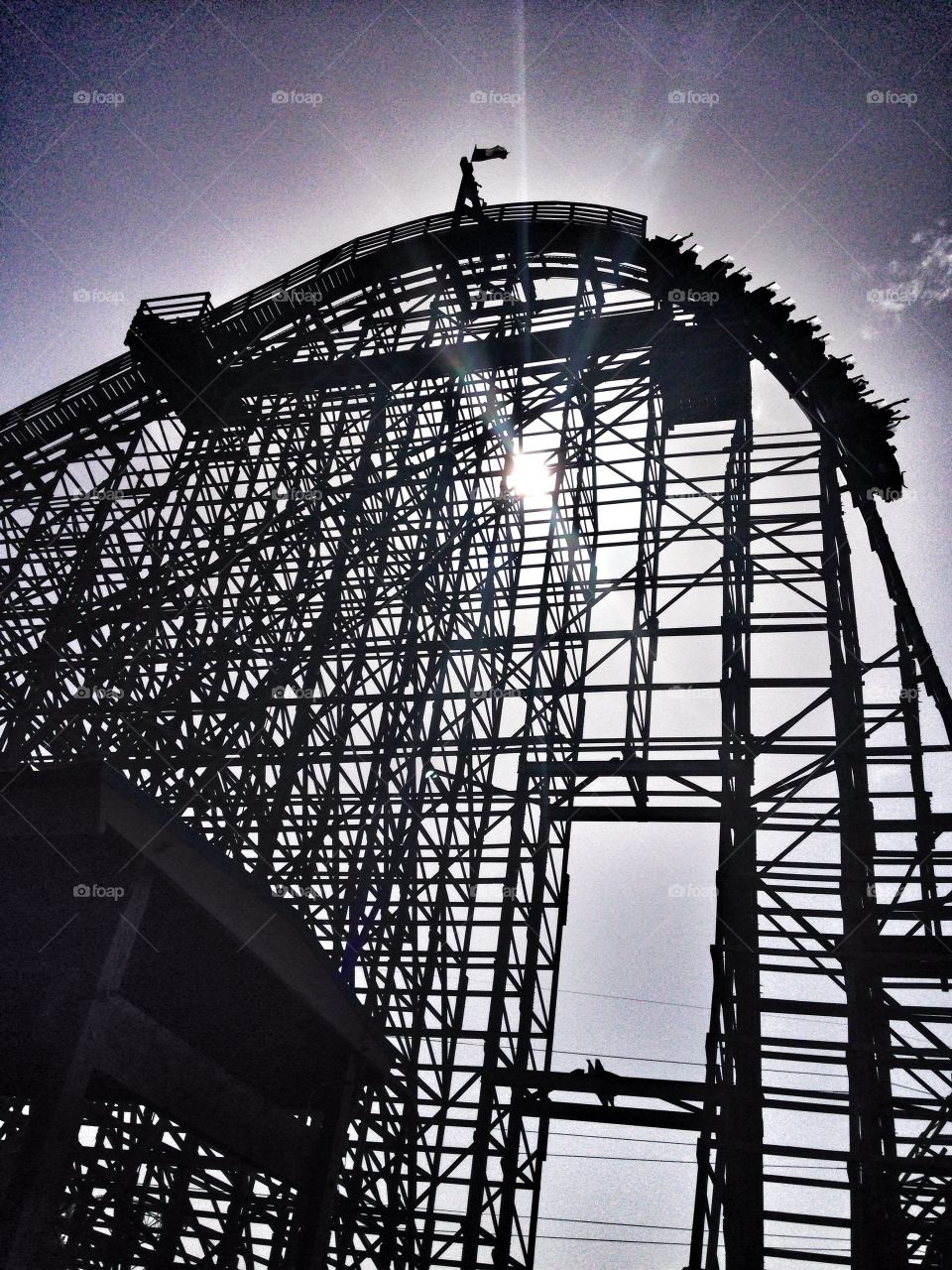 Hands up. People riding Texas giant roller coaster with hands up