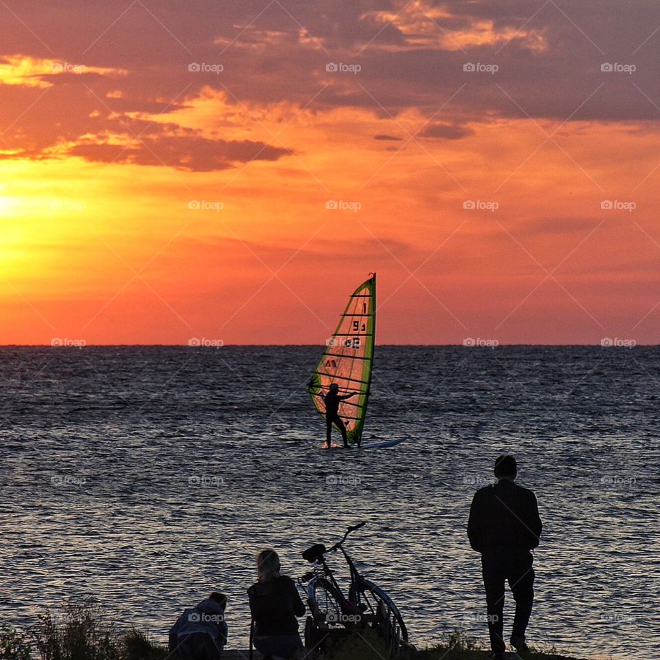 Windsurfing in sunset