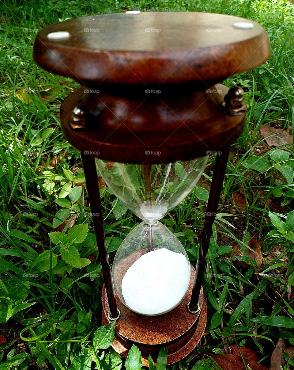 This is an old hourglass, wonderfully preserved.