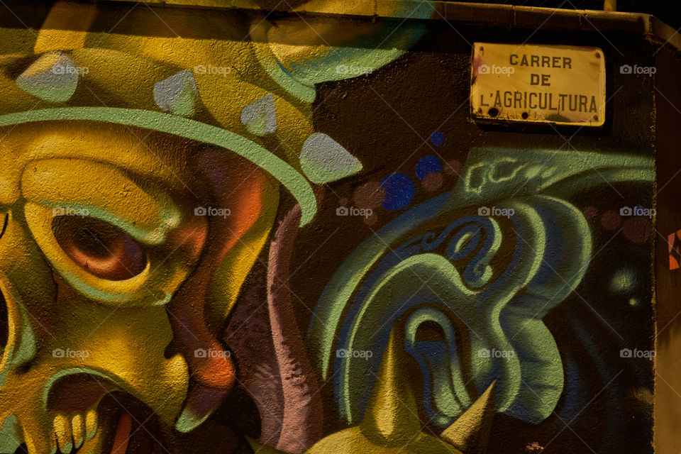 Night lights over a Graffiti Wall: DeathAagriculture 