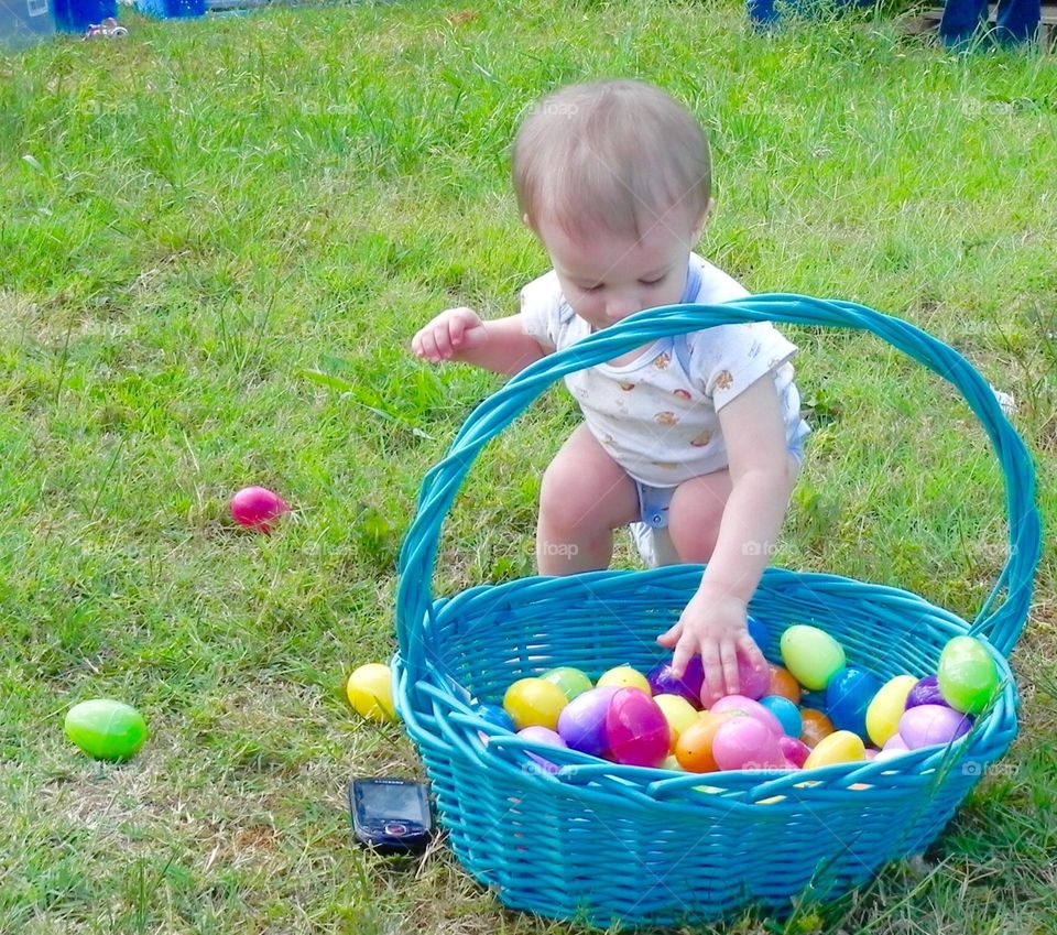 Colorful eggs in a Easter basket 
