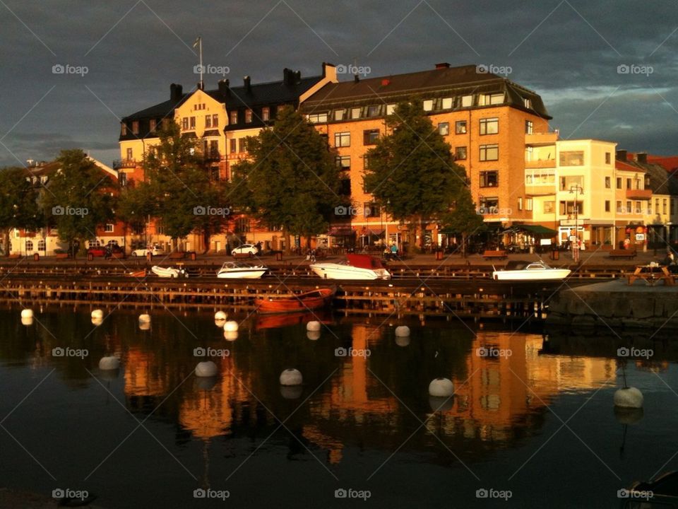 sweden yellow sunset boats by lenacarlsson