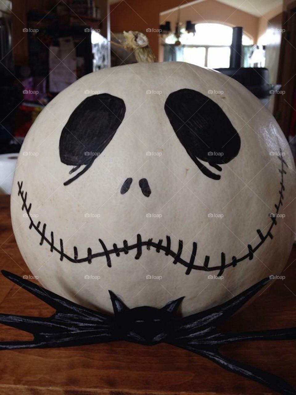 White pumpkin as Jack the skeleton 