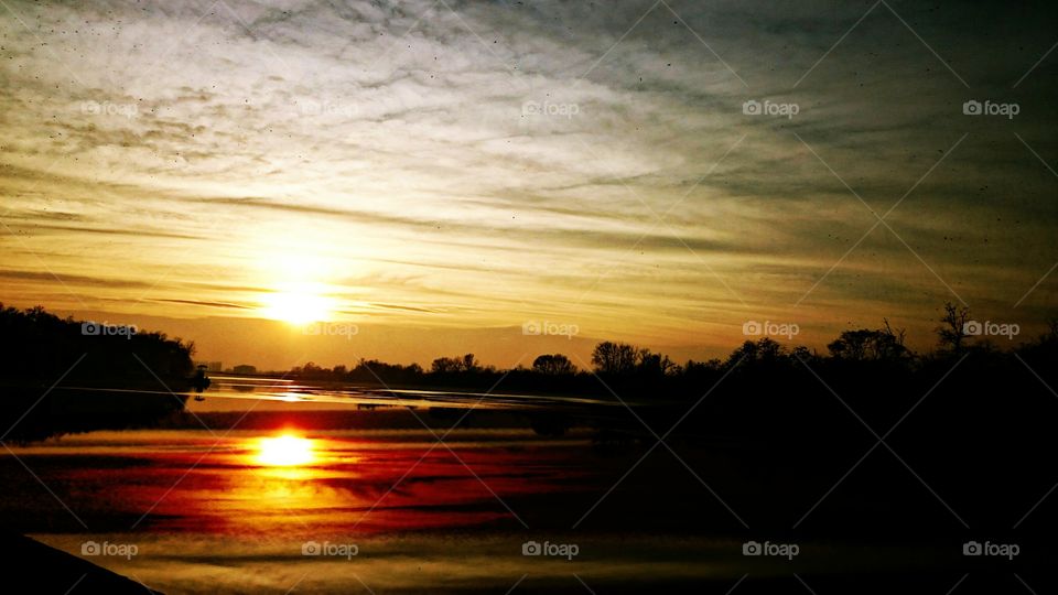 Sun reflecting on lake