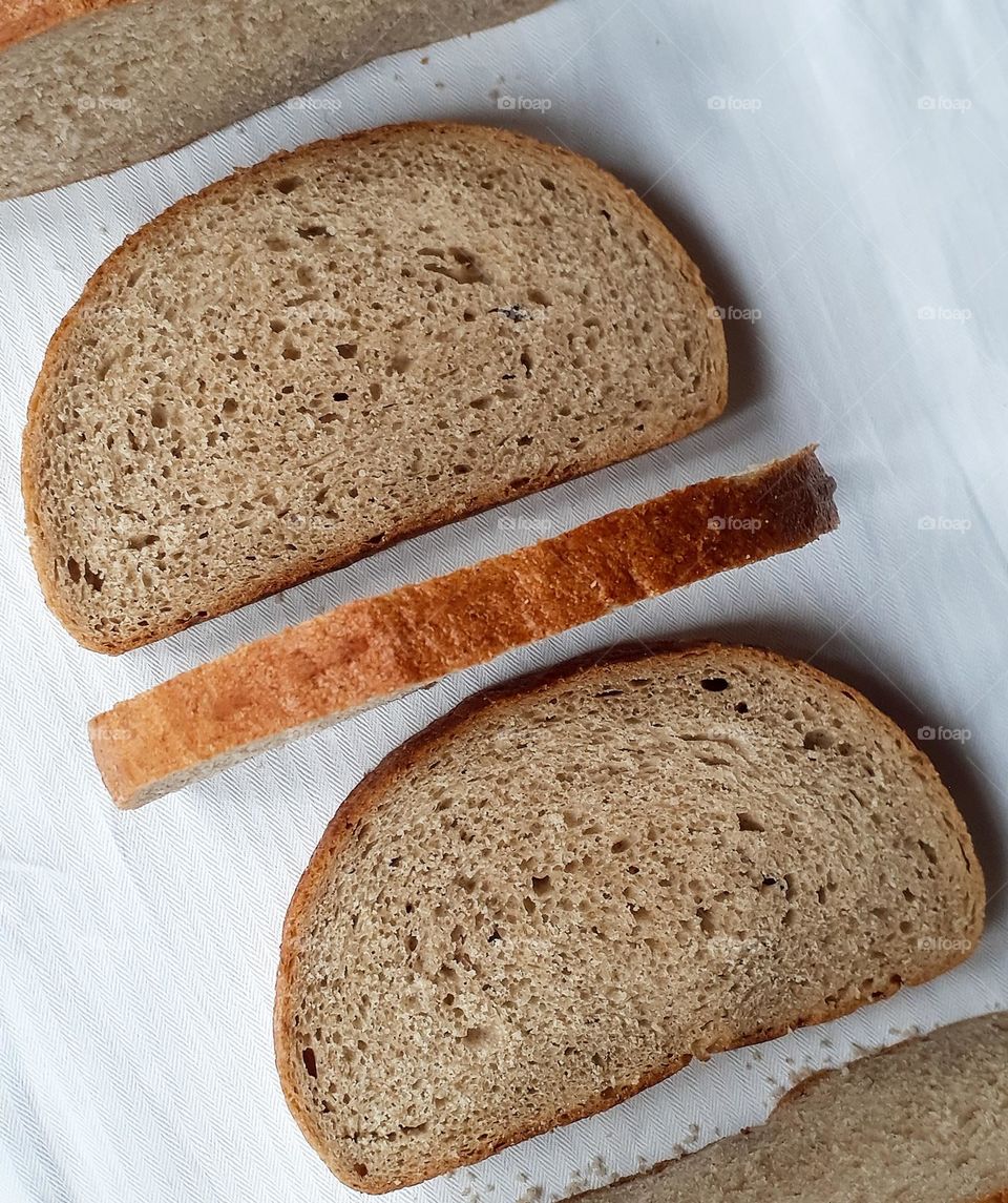 Pieces of black wheat bread