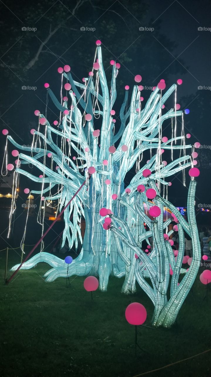 Art installation with bright, colorful lights and designs