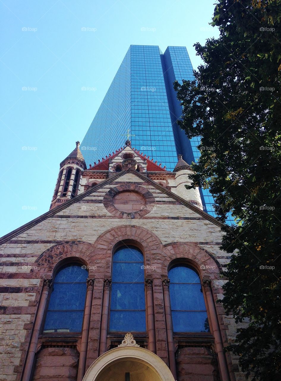 Old vs. new . Trinity Church is dwarfed by the Hancock Tower - looking up mission 