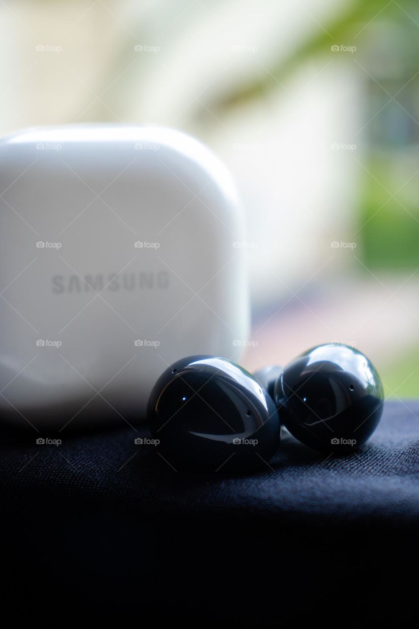 Listening to music all the way together. Samsung Galaxy wireless bluetooth earbuds. Easy to use, handy, lightweight and affordable.