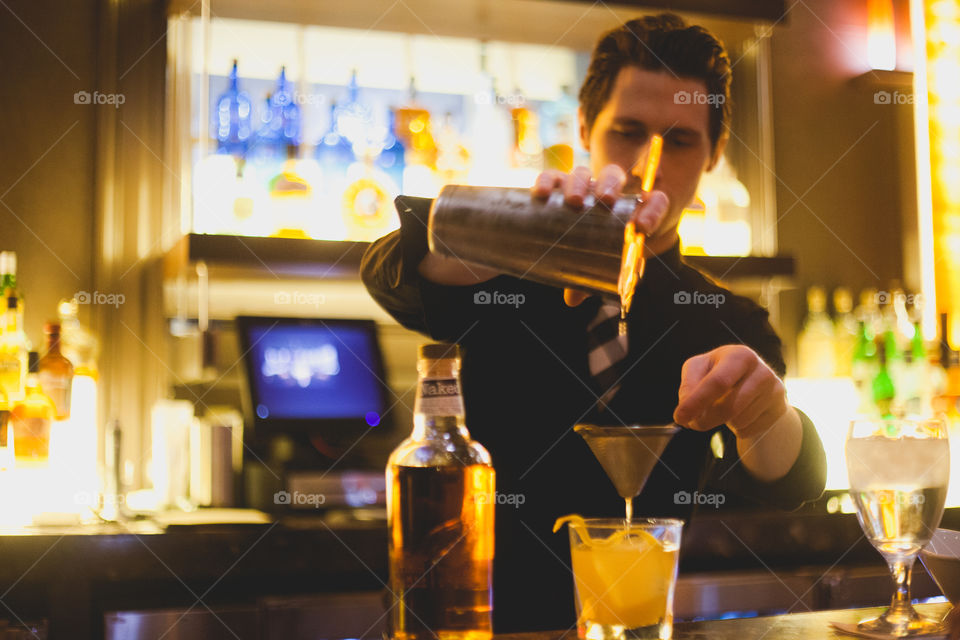 Bartender making a cocktail