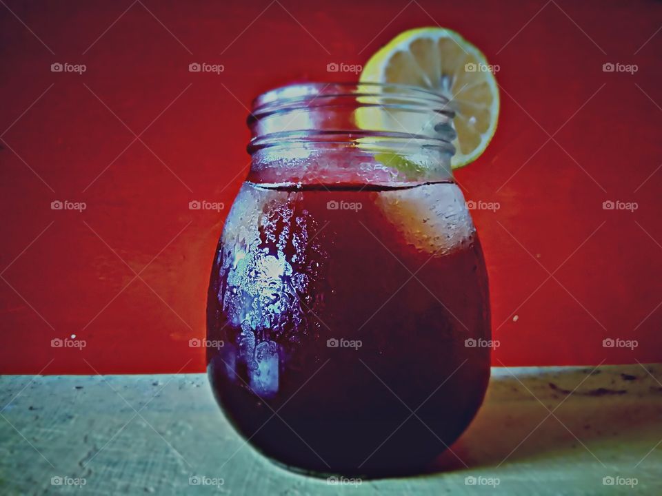 a refreshment made by my own experiment...iced red tea with a bit of turmeric