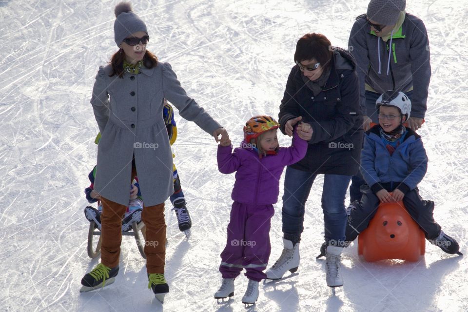 Families on ice rink