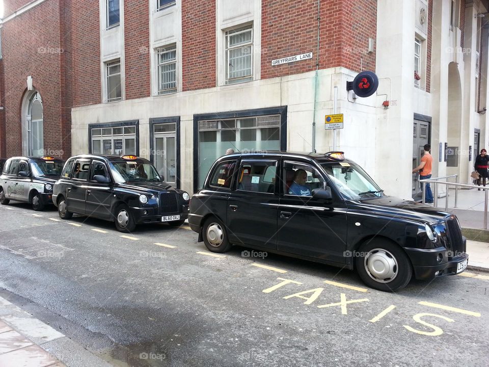 Row of typical British cabs