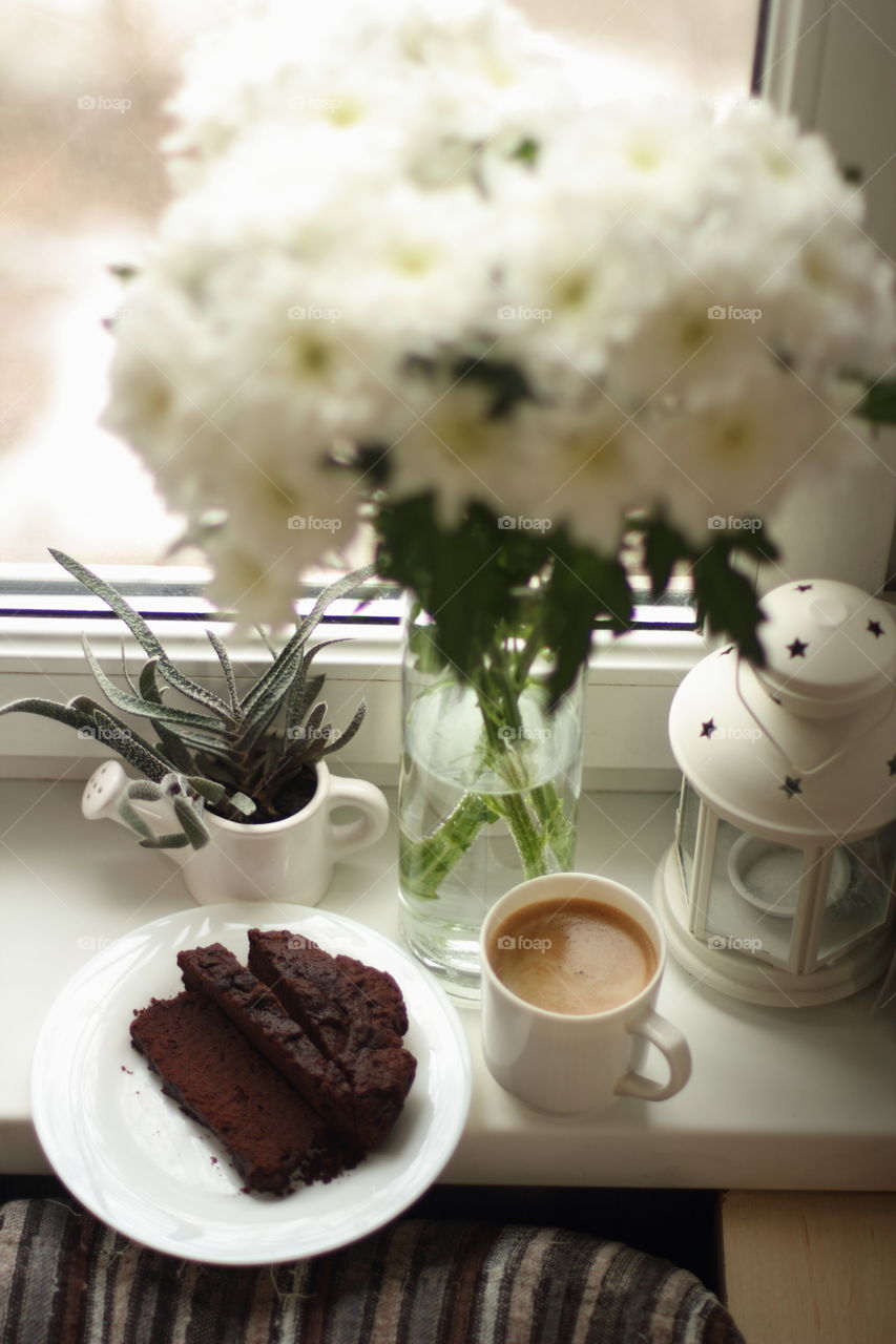 uncut brownie, coffee, bouquet, succulent, lamp