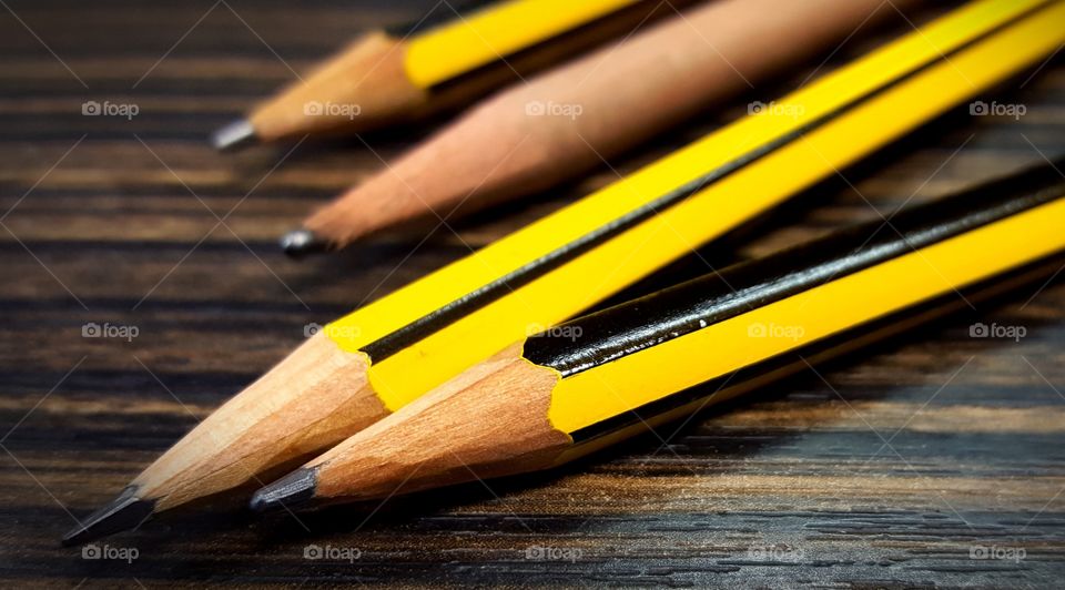 Pencils on a table.