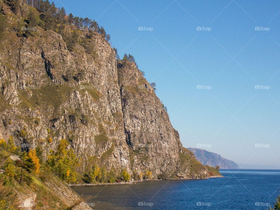 Khabartuysky cliff, where silver gulls nest in spring. 144 km of the Circum-Baikal railway, cape Khabartui, Slyudyansky district, Irkutsk region, Siberia, Russia.