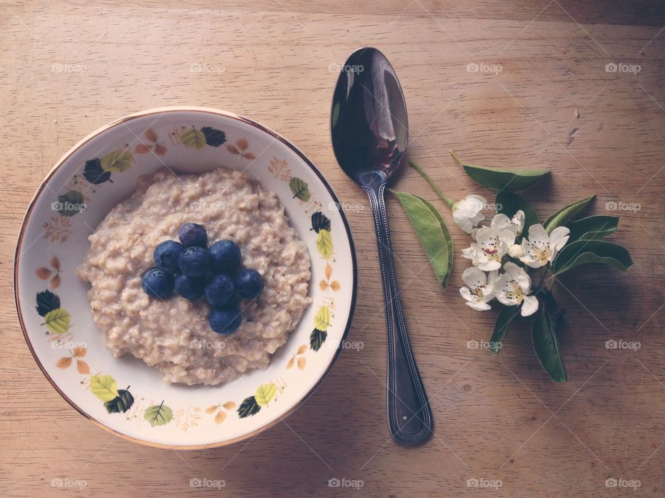 Bowl of porridge. Bowl of porridge with blueberries 