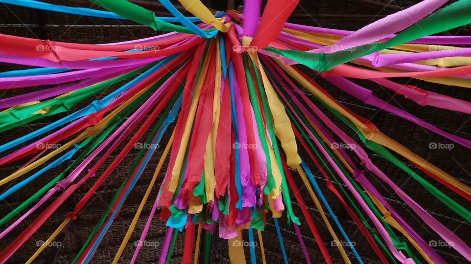 Colorful fabrics tie on the beams
