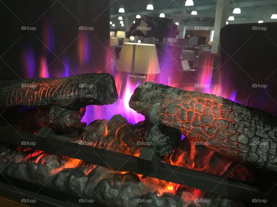 FIRE WOOD BURNING IN FIRE PLACE 