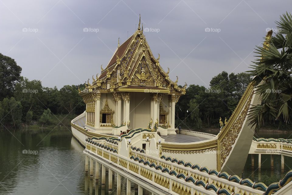 Church building in Buddhist temple on board A tourist attraction in Ubon Ratchathani, Thailand.