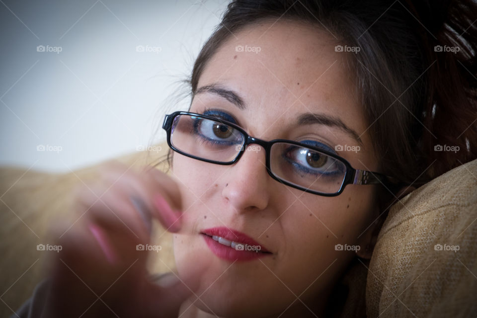 Girl doing love sign