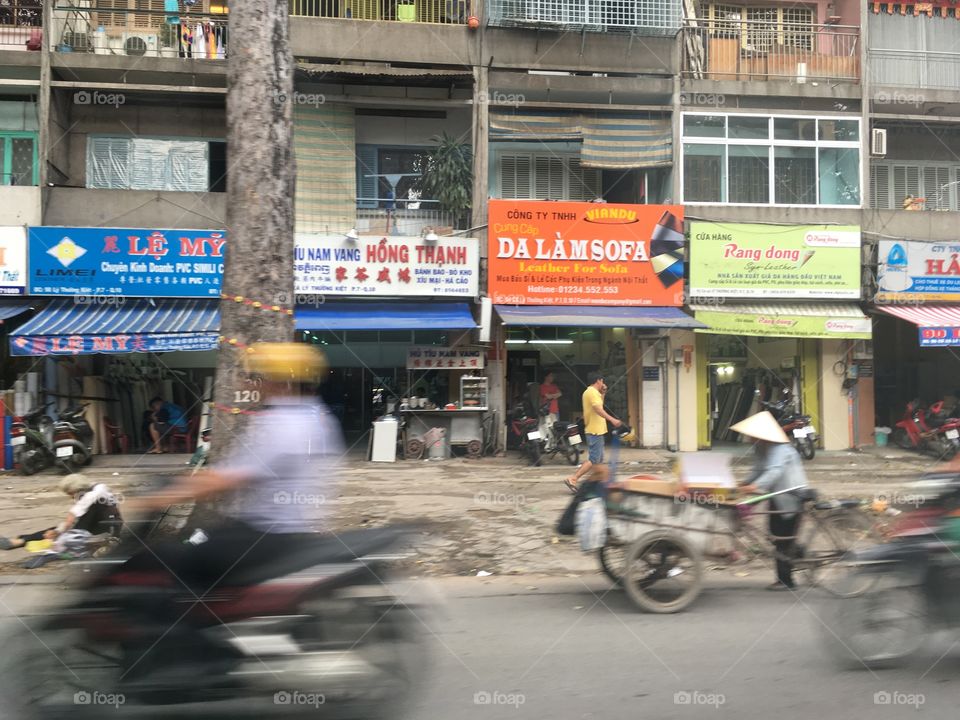 Street scene and buildings in Ho Chi Minh city Vietnam 