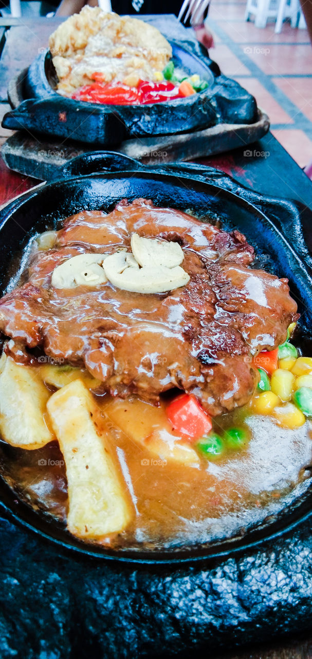 Enjoy beef steak in the afternoon