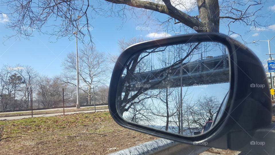 View of bridge through mirror