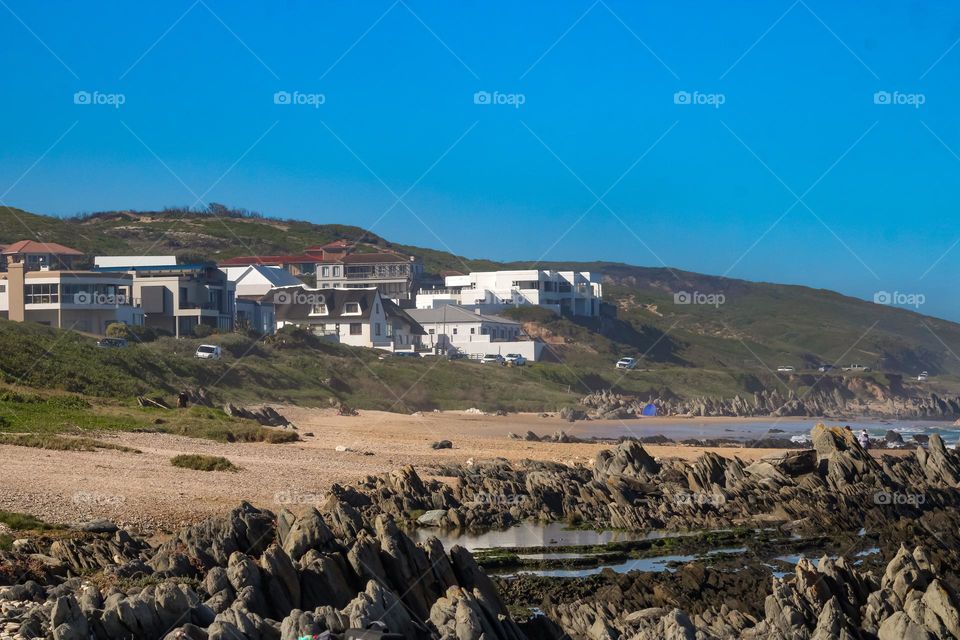 Seascape with beachfront houses