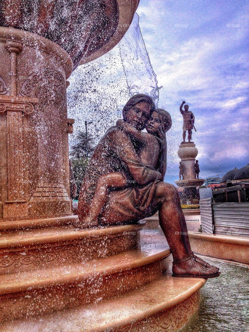 Statue in water