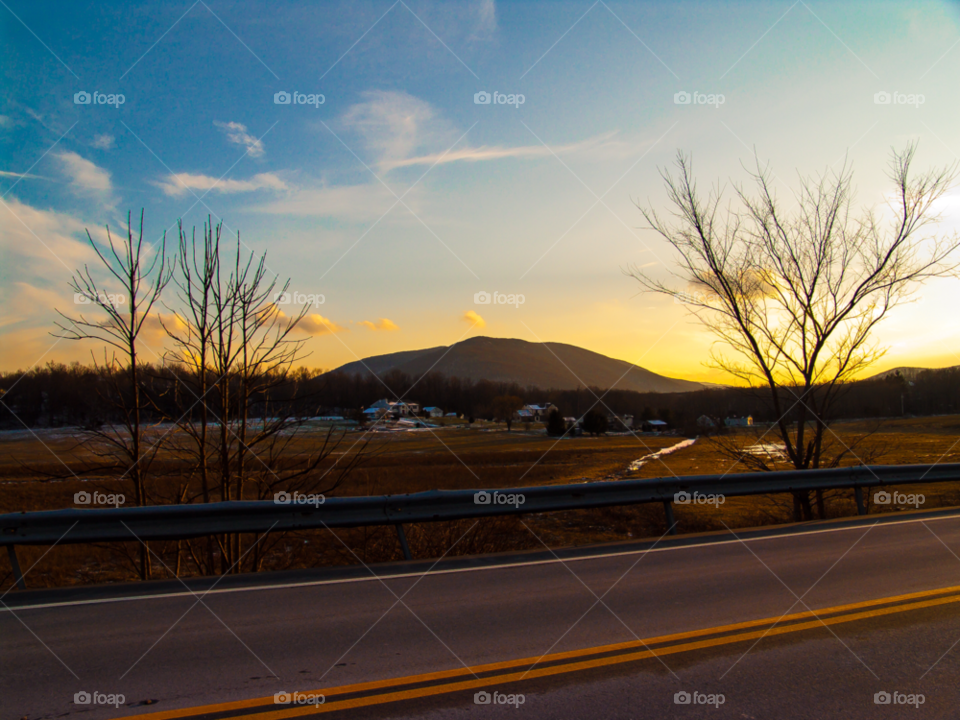 winter mountain sunset trees by delvec